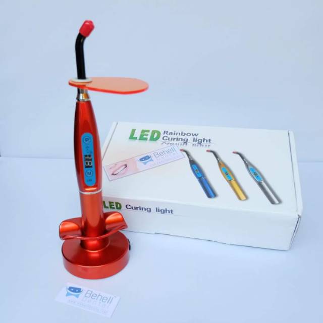 Laser behel rainbow . Light cure . Light curing LED . Laser lem behel Orthobonding