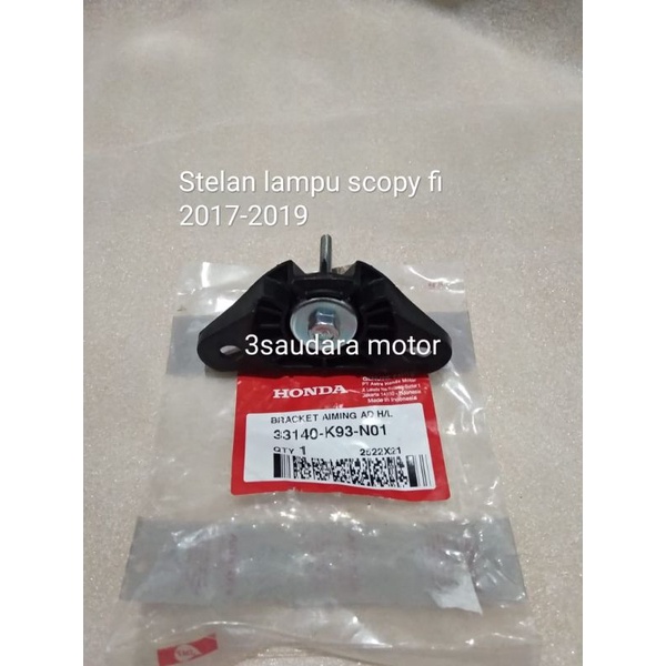 33140 K93 N01 BRACKET AIMING STELAN LAMPU SCOPY FI BAN RING 12 Tahun 2017-2109 ori ahm