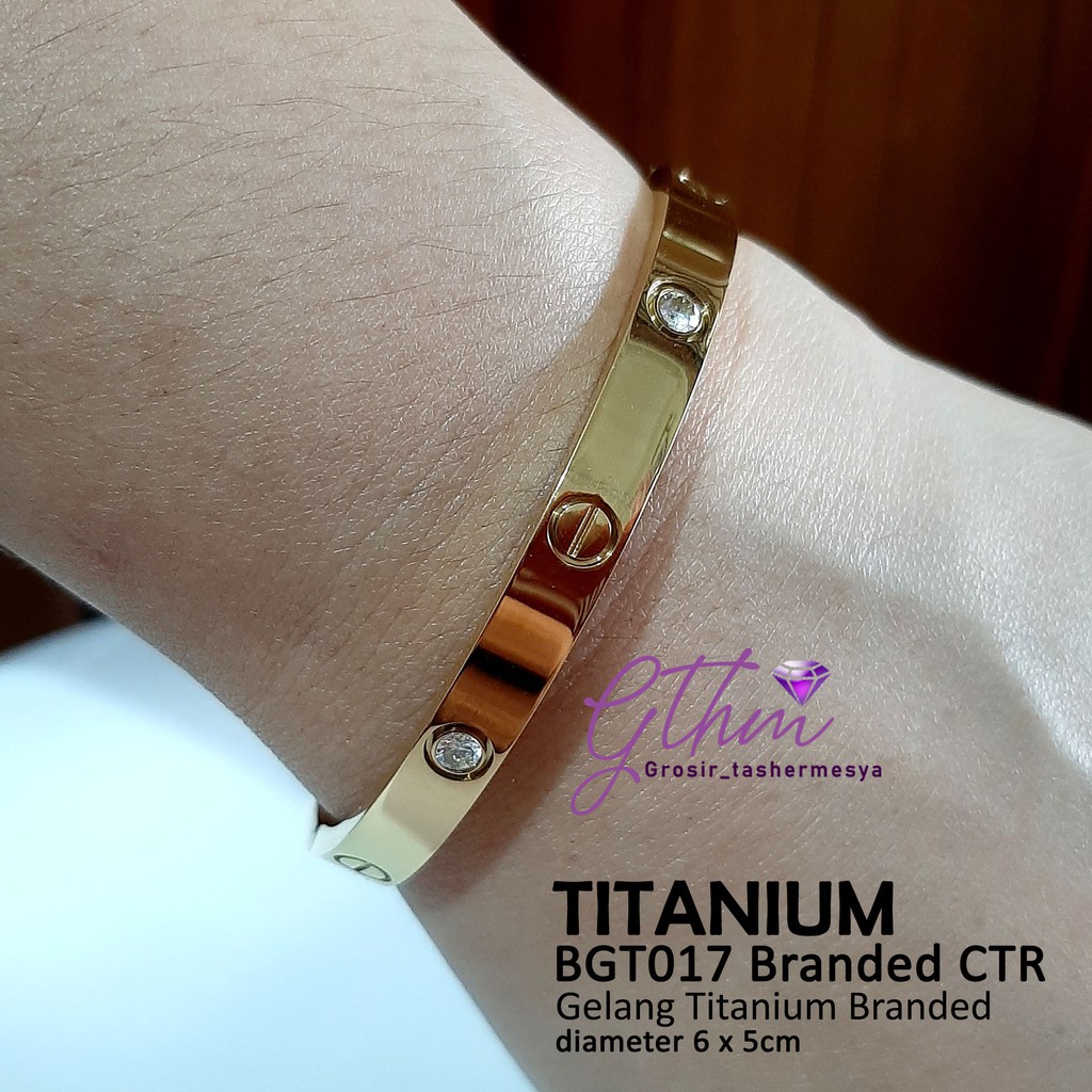 Gelang titanium cap 750 permata bgt077