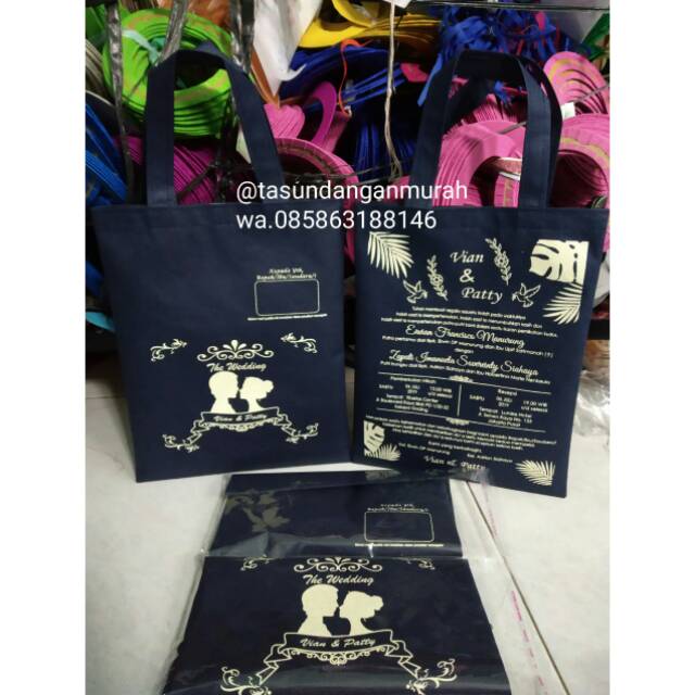 

Tas undangan warna dongker tinta cream
