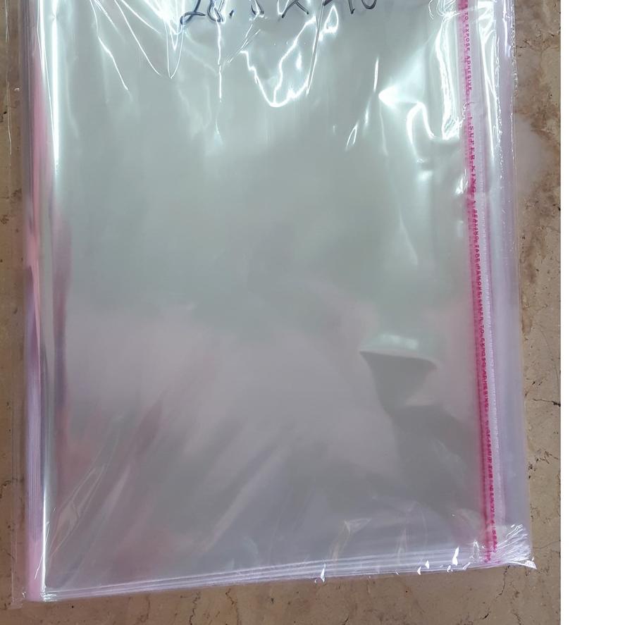 

Hot Sale - Plastik OPP 28,5 X 40 CM 20 MIC 100LBR Lem Atau Seal / Plastik bening kemasan bungkus baju gamis celana garment termurah