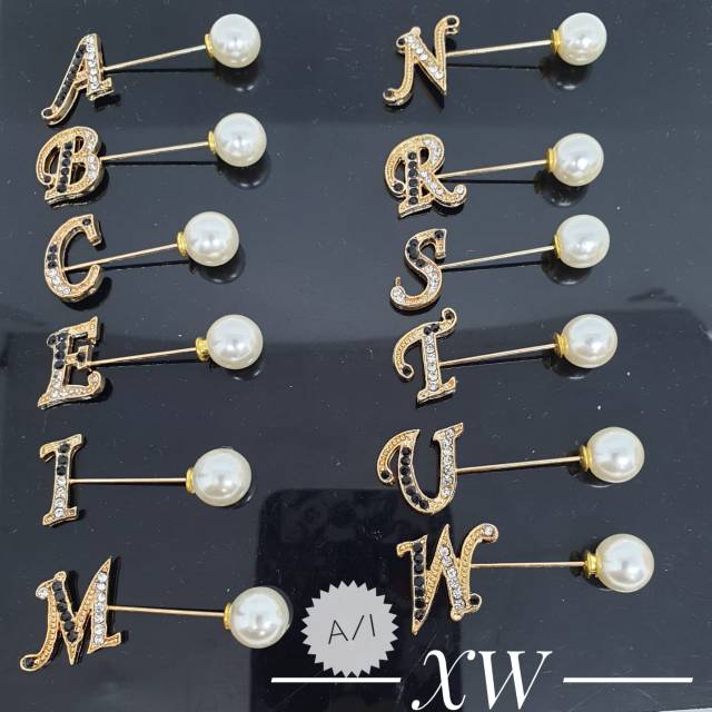 Bross tuspin huruf
