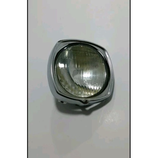 reflektor lampu depan V75 original BEKAS.