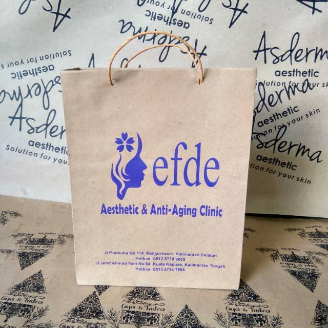 

Paperbag kraft coklat free desain..size pxlxt 18cmx6cmx23cm