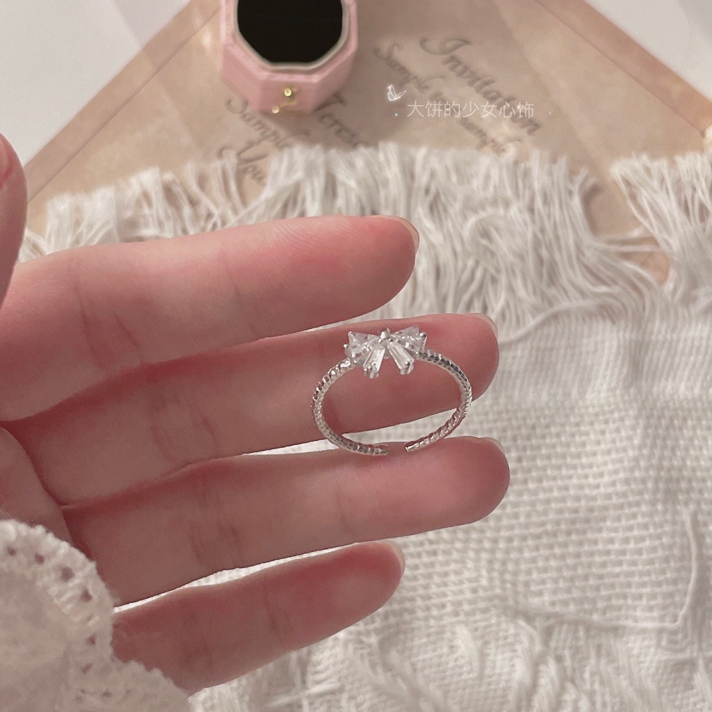 Cincin Model Terbuka Bahan 925 Silver Desain Pita Hias Kristalberlian Imitasi Adjustable Untuk Wanita