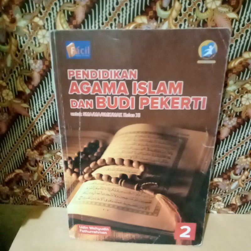 PENDIDIKAN AGAMA ISLAM DAN BUDI PEKERTI 2 SMA/MA/SMK/MAK KELAS XI 11 REVISI GRAFINDO