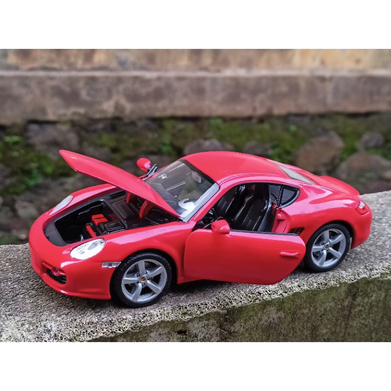Welly 1:24 porsche carrera S merah