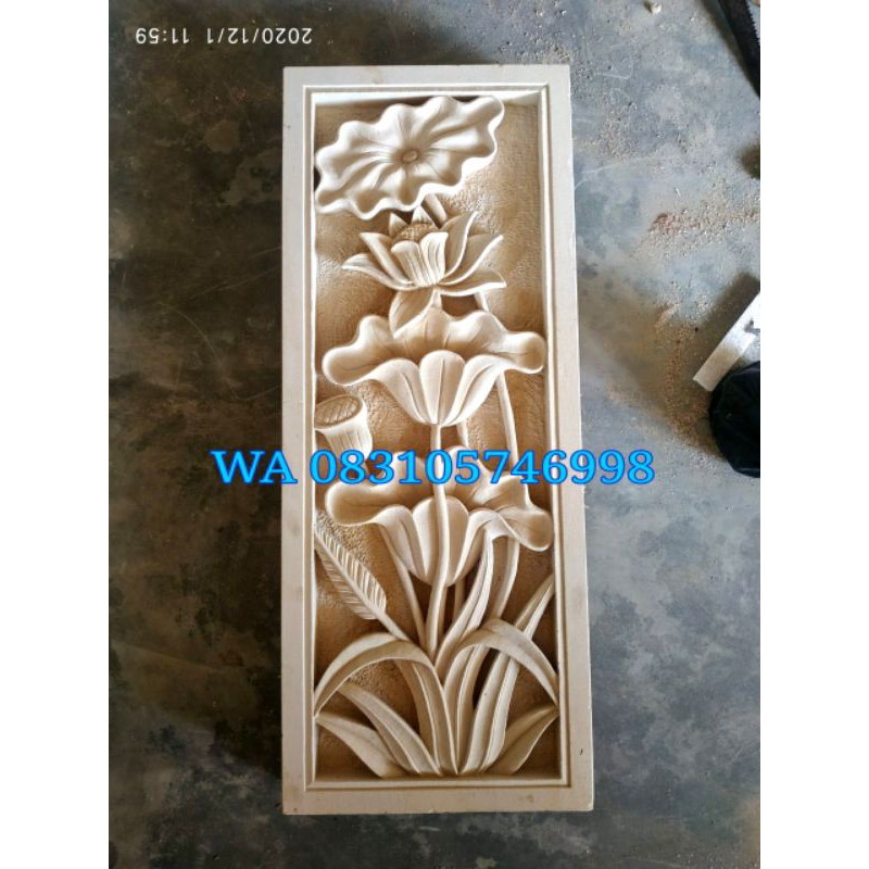 relief batu paras ukiran  lotus