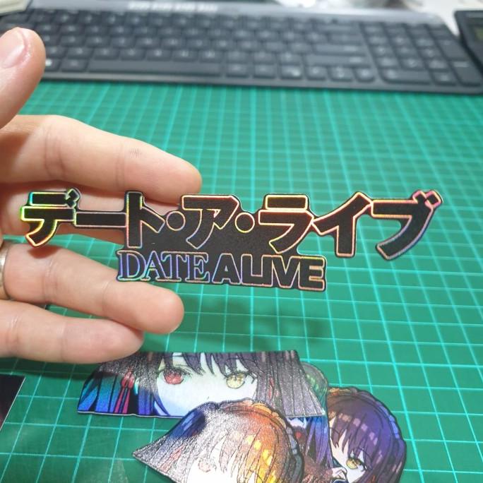 

(BISA COD) Sticker Hologram Anime Besar - PSH1033 - Date Alive Logo TERUJI Kode 34