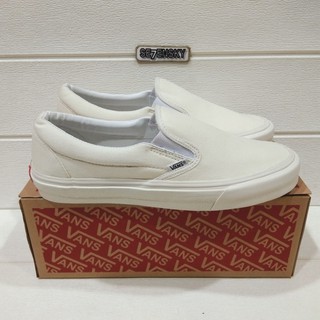 vans slip on cream white