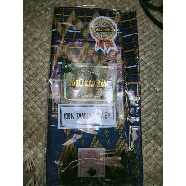 Kain sarung motif Karo