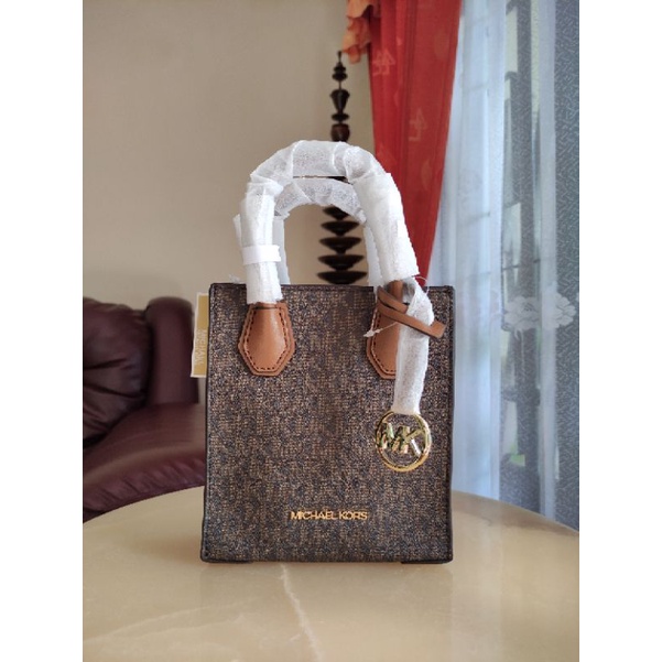 mk mercer xs sign brown black