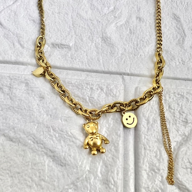 Kalung boneka smile titanium korea style anti karat - ercassia