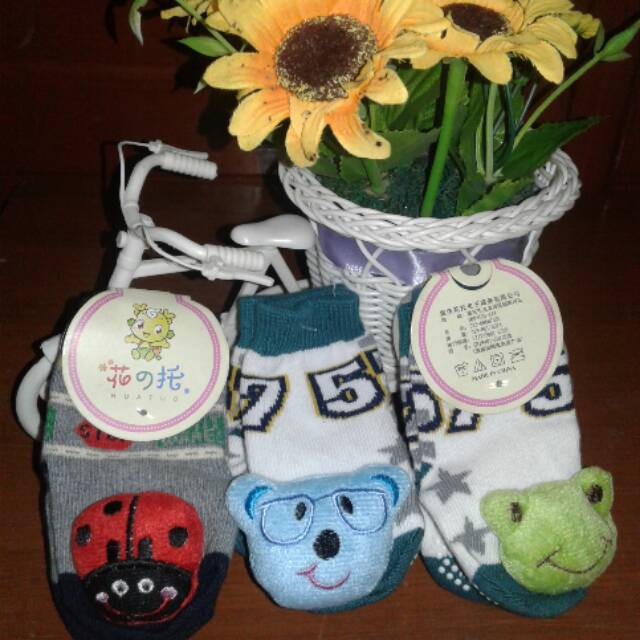 kaos kaki bayi rattle bunyi