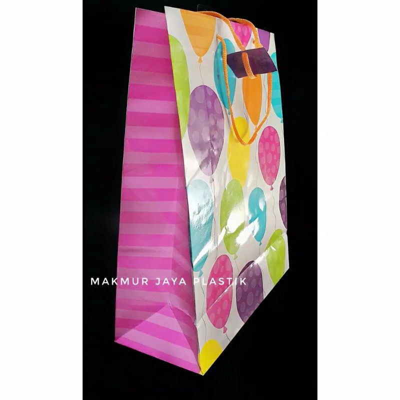 

PAPER BAG XL MOTIF PARTY XL 30 X 40 X 12 ISI 5 PCS