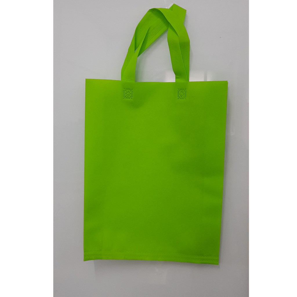 

Tas Press Spunbound Tali Goodie Bag Tas Belanja Warna Hijau Muda 30 cm x 40 cm