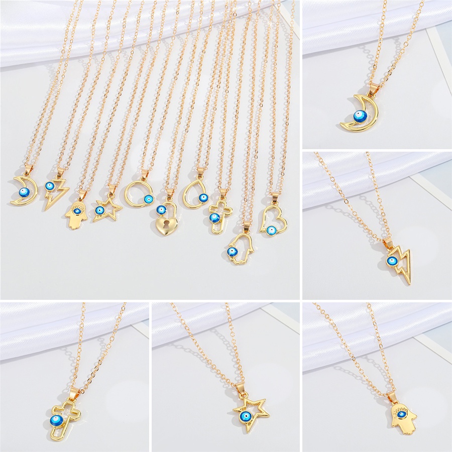 Kalung Rantai Klavikula Emas 18k Hias Liontin Hati Salib Mata Biru Model Rongga Untuk Unisex