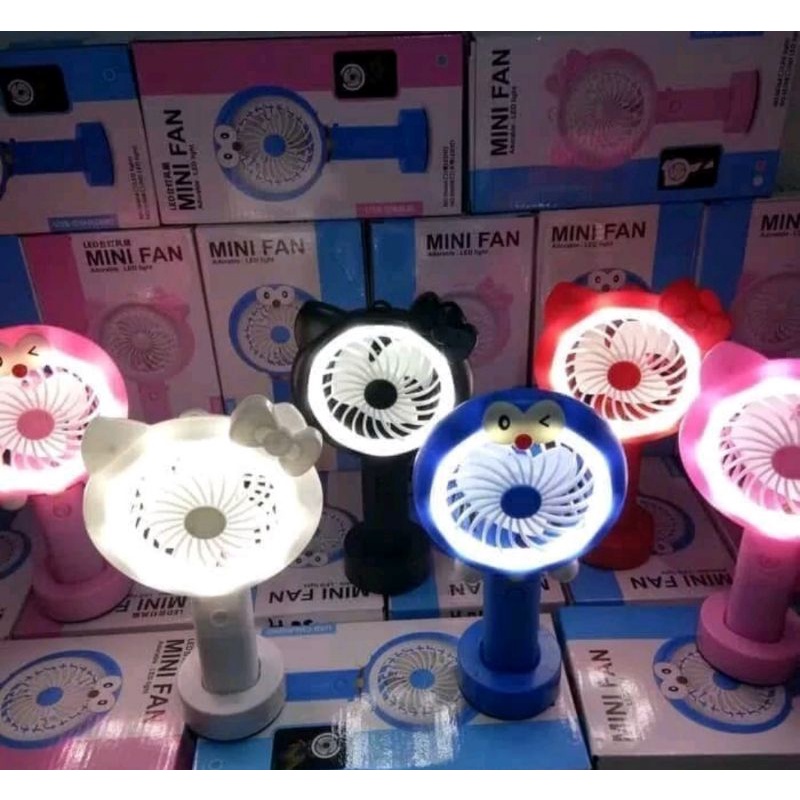 Kipas Mini Tangan Genggam Tancap Karakter Doraemon Hello Kitty Fan Led Light Lucu Unik Portable USB