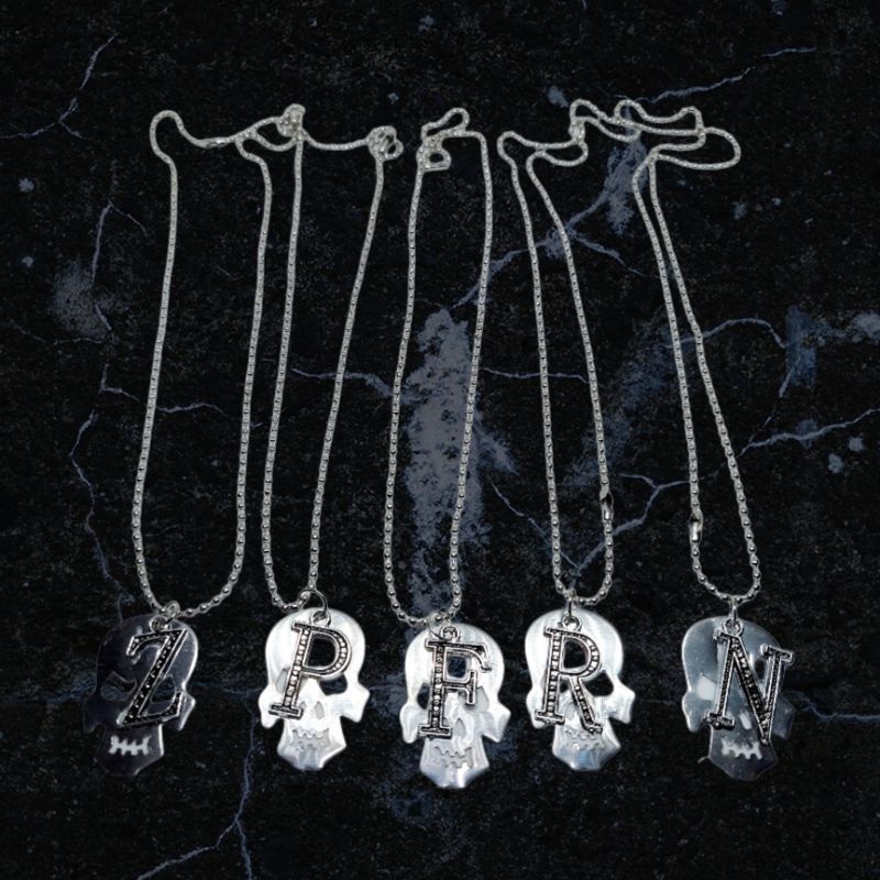 kalung metal huruf anti karat