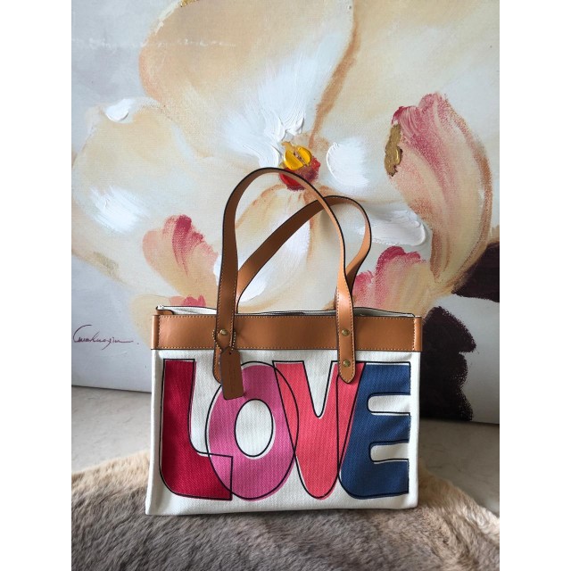 Coach tote 33 with love print sale