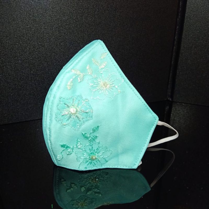 Masker kain Motif Bunga Warna Biru Tosca 3ply dengan filter spunbond
