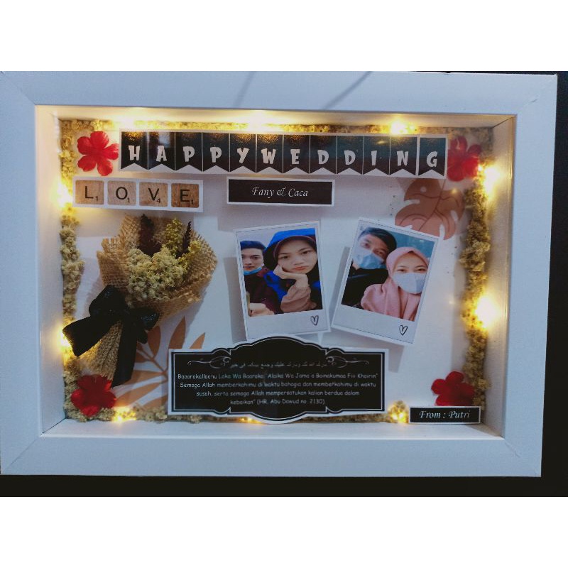 

Frame 3D kado pernikahan