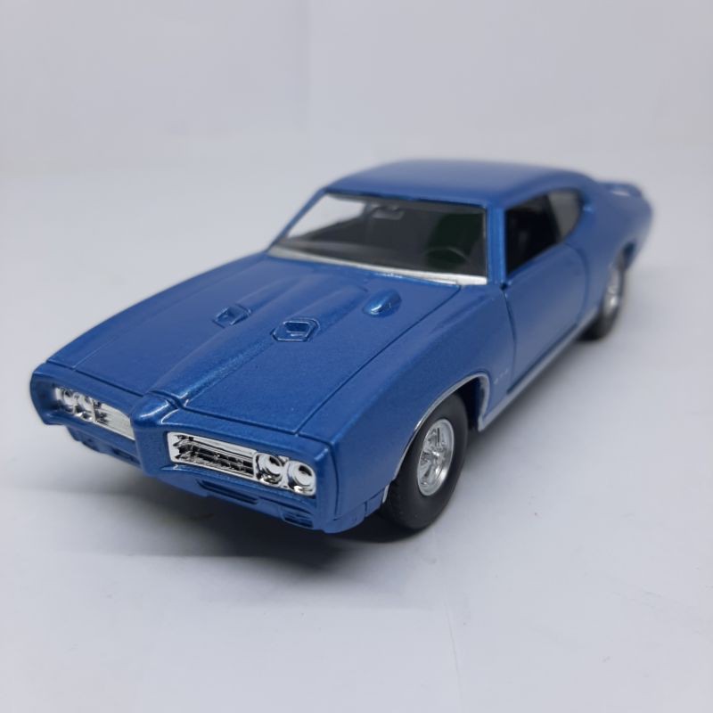 Diecast Miniatur Mobil Klasik 1969 Pontiac GTO Welly Nex Diecast Scale Model