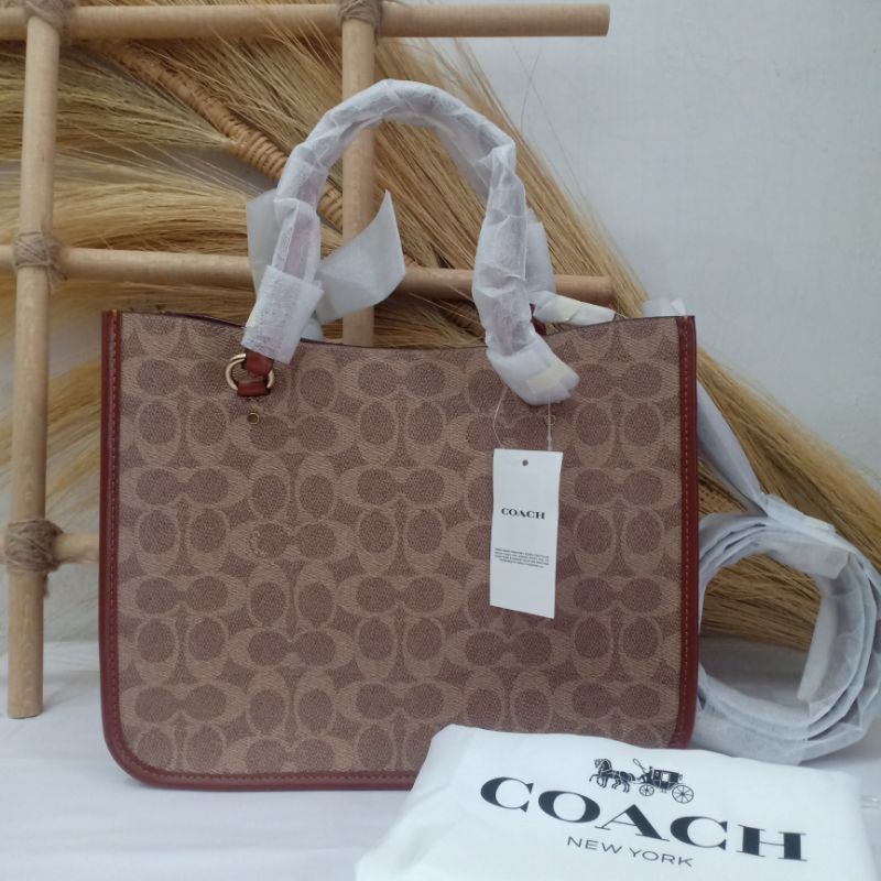 Coach Tyler Carryall 28 tan rush