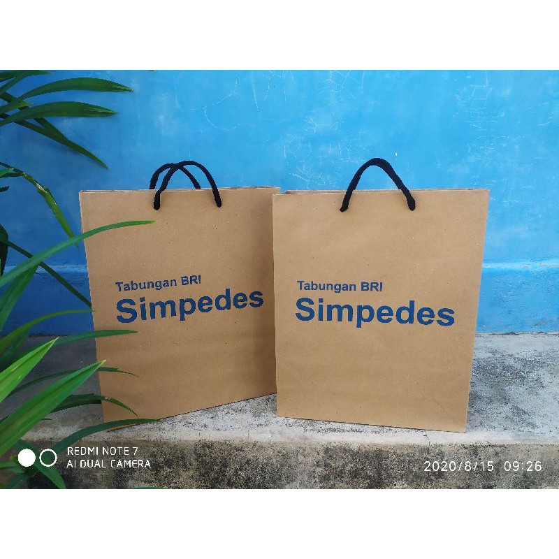 

Paperbag kraft coklat size P25 x L10 X T30 sablon