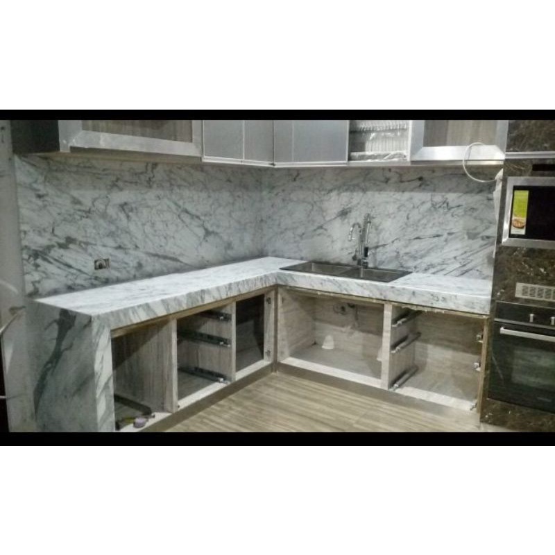 Top table marmer italy buat kitchen setHarga standar lebar 60cm sdh terpasang
Marmer carara 1,550,00