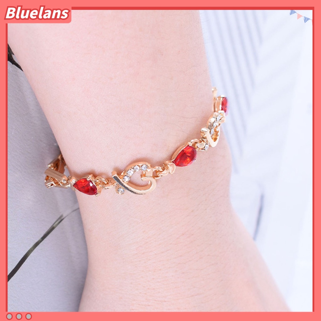 Gelang Rantai Desain Hati Hollow Aksen Berlian Imitasi Warna Merah Bahan Alloy Untuk Wanita