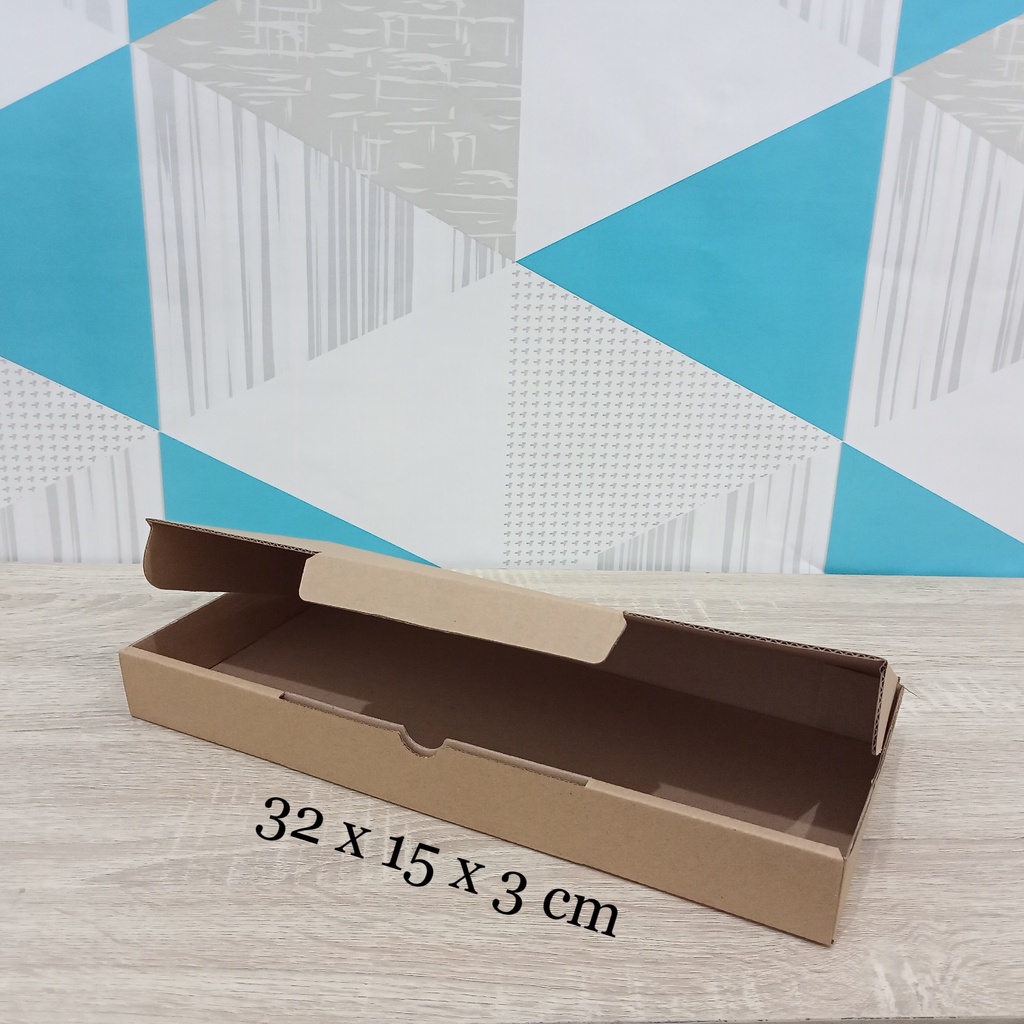 

Kardus 32 x 15 x 3 cm....Die Cut kotak aksesoris dll