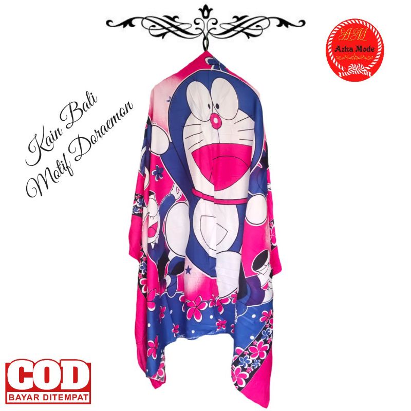 Kain Bali Pantai - Kain Bali Motif Karakter Doraemon Jumbo - Sarung Pantai Aksa Baliz - Sarung Bali 