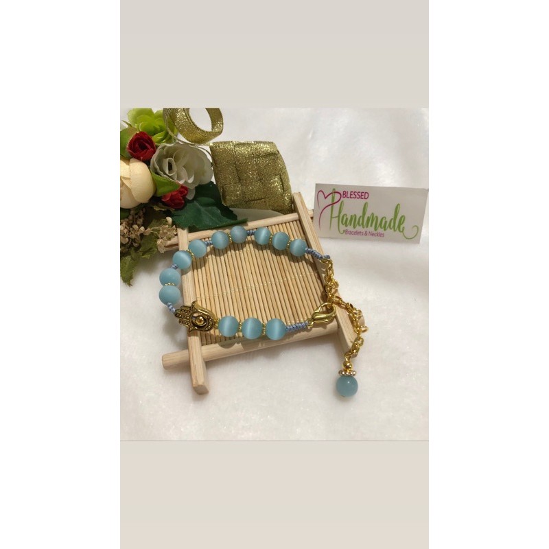 Gelang batu cat eye blue Hamsa Hand gold
