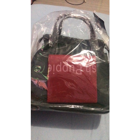 mini sling bag hush puppies