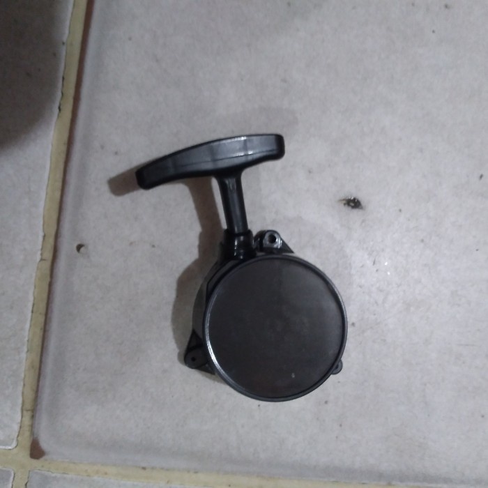 tarikan stater mesin rumput