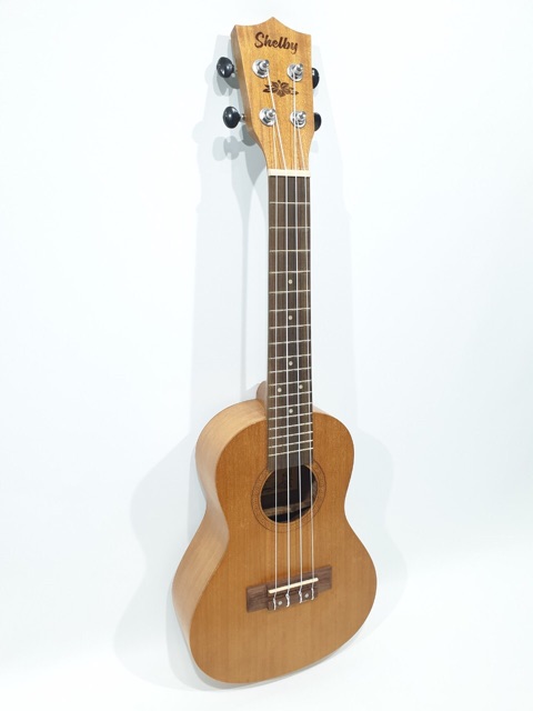 Ukulele Concerto Merk Shelby Tipe SU-23 M STNT Original Ukuran 23 Inc Warna Coklat Tua Ukir Murah