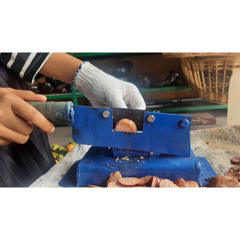 alat pengiris pinang