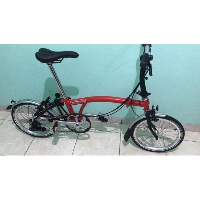 Sepeda brompton house red