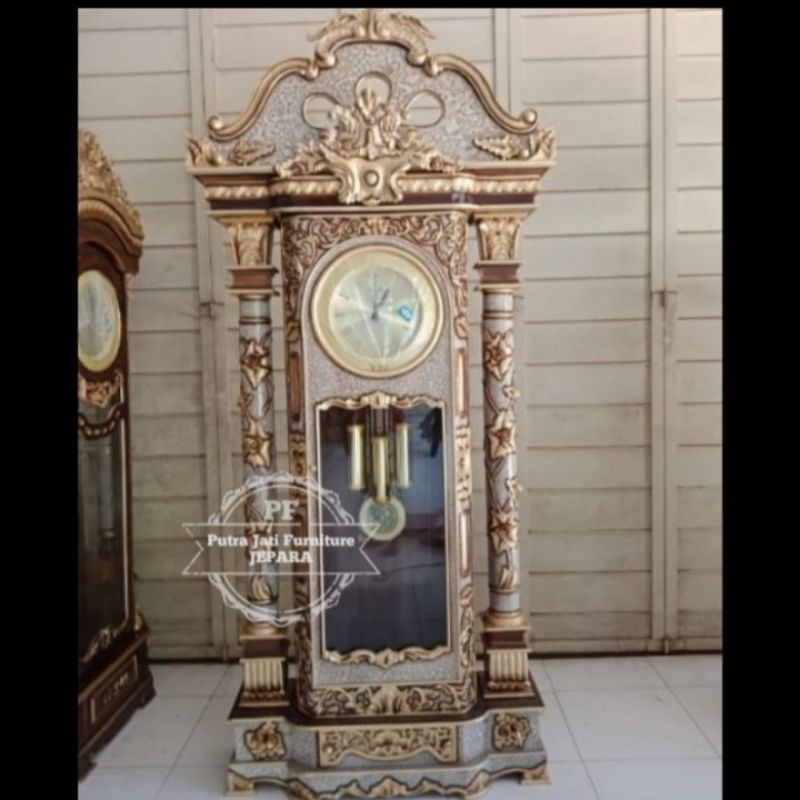 Lemari jam masjid besar - Jam hias pajangan full ukir Jepara kayu jati mebel Jepara