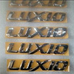 emblem LUXIO asli bawaan mobil bosku