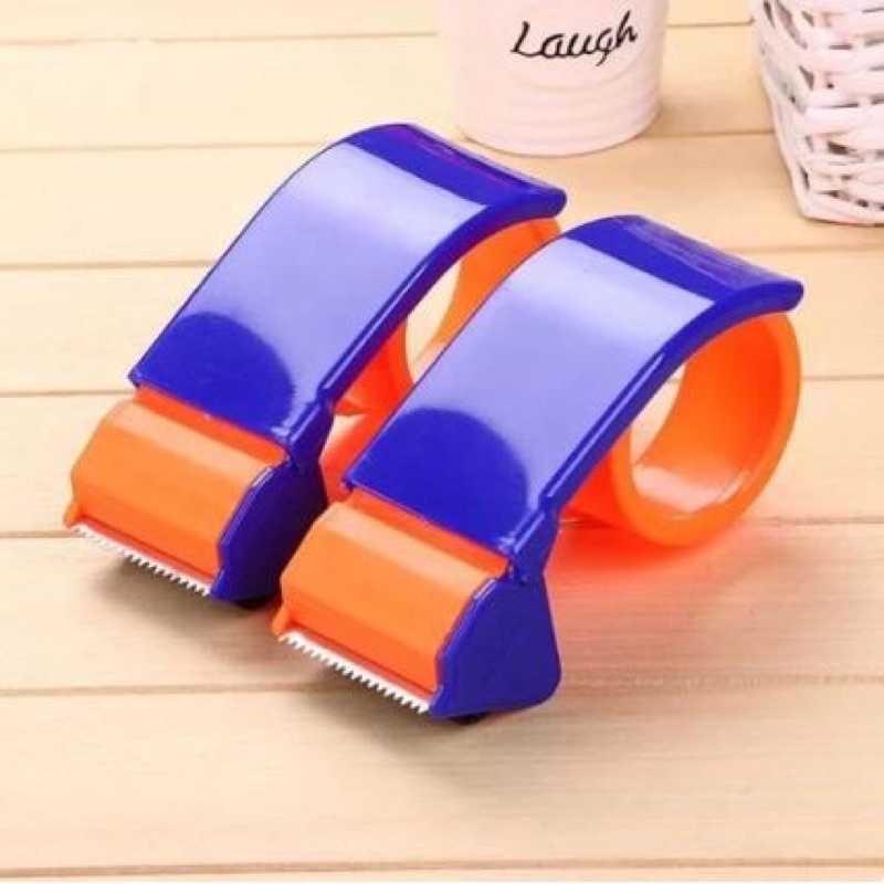 

DISPENSER TAPE LAKBAN 2 INCH PEMOTONG LAKBAN / RUMAH LAKBAN / TEMPAT ISOLASI LAKBAN