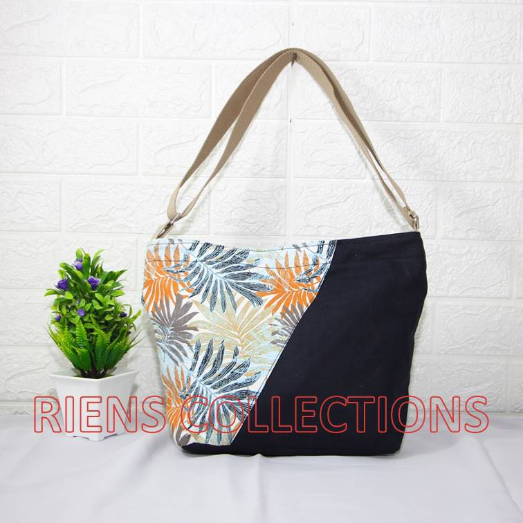 RIENS COLLECTIONS. TAS SELEMPANG SLING BAG KANVAS KOMBINASI FLORAL PALM ORANGE SLC0102