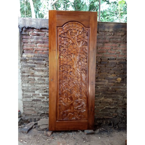 Pintu kamar ukir relief bunga asli ukir dari Jepara Jawa tengah.