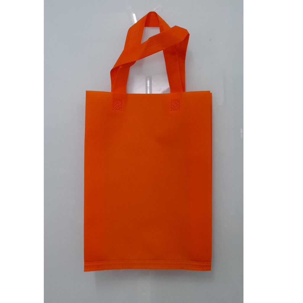 

(Lusin) Tas Press Spunbound Tali Goodie Bag Tas Belanja Warna Orens 25 cm x 35 cm