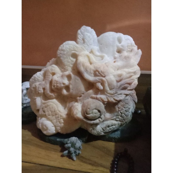 ukiran naga batu alam