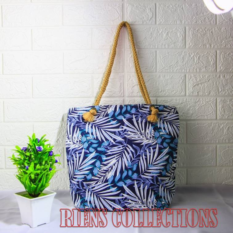 RIENS COLLECTIONS. TOTEBAG TALI KEPANG SUMBU MOTIF FLORAL PALM BIRU. TAS KANVAS. TAS JOGJA. SOUVENIR JOGJA