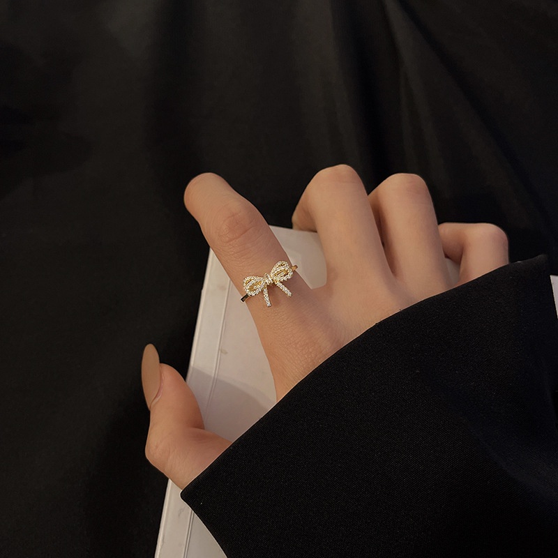 Cincin Jari Telunjuk Adjustable Desain Pita Full Berlian Imitasi Untuk Wanita