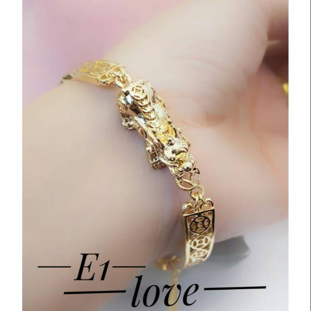 Gelang naga lapis emas