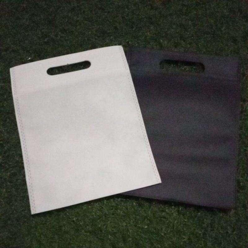 

goodie bag goodie spundbond polos 20x26 mix colour random